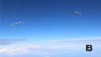 SU-30SM filming other SU-30SMs launching air to air guided missiles, presumably at a target drone [video]