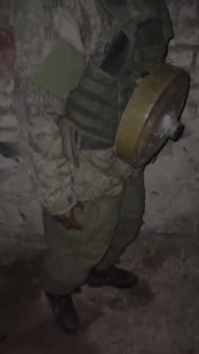 Russian soldiers strapped an anti tank mine to African soldier