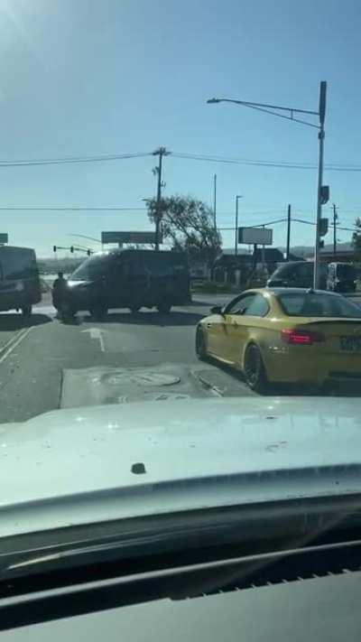 This Amazon driver blew a stop sign, stopped short and blocked two lanes of traffic. He then jumped out and held a stop sign at us so that an entire fleet of Amazon vans could also ignore the intersection stop sign.
