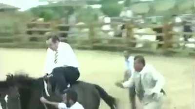 Turkish president Erdogan falling off a horse