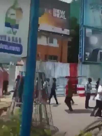 Protester in Kinshasa raiding a foreign owned supermarket in anti-western protest