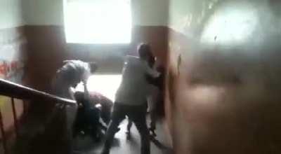 Girl holds her own in a fight with boys