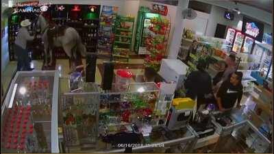 Drunk man rides horses into liquor store😂