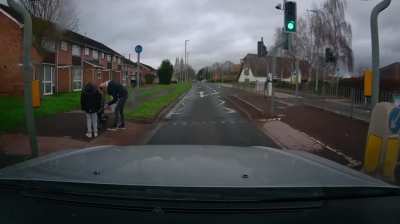 Kid Rides into road on bike