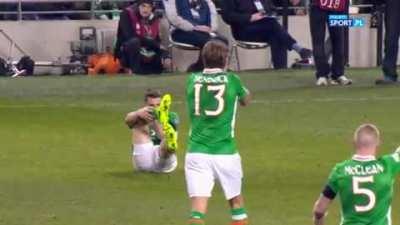 Soccer player got his leg broken during a tackle.