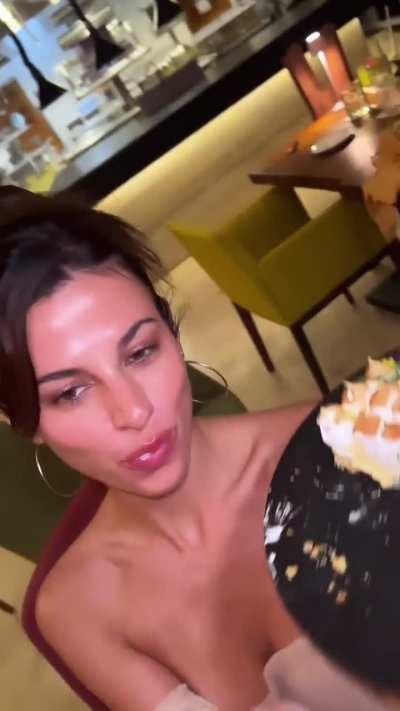 Licking off some birthday cake 