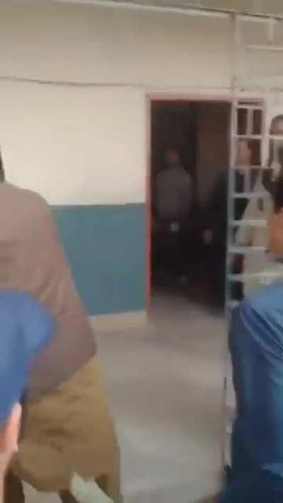 PPP's candidate for NA-242 (KHI), Qadir Mandokhel, breaks into polling station with his entourage and destroys the ballot boxes. 