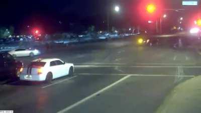Car saves people from certain death while crossing the street.