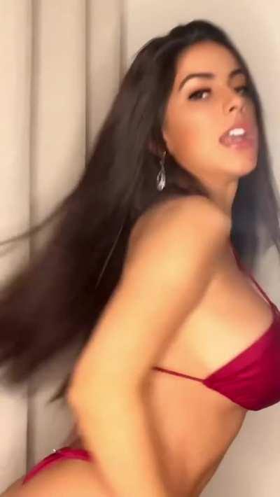 Latina brunette in big tits bikini