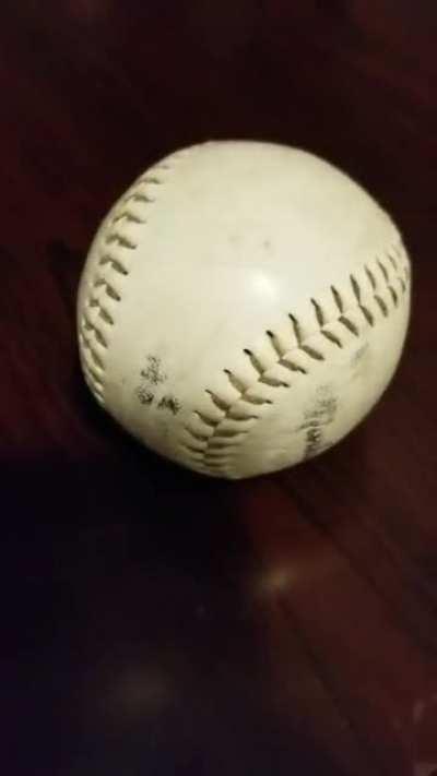Recorded a video of my used baseball sitting on a desk doing nothing... Maybe.