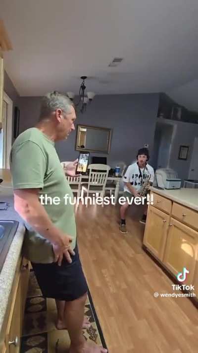 His son is learning to play the saxophone and he's trying to be supportive.
