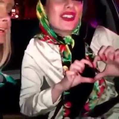 Singing and dancing while driving a car