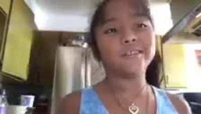 Making milkshakes with her little sister...