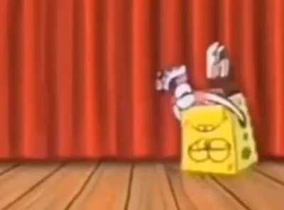 squdward gets springlockted in a spongbob suit.