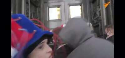 Protesters argue whether or not to listen to Trump’s tweeting them to go home. Credit Sputnik on YT.