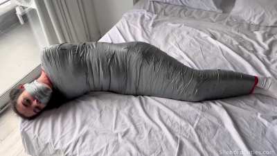 Mmmphing softly inside my shiny mummy wrap... heaven