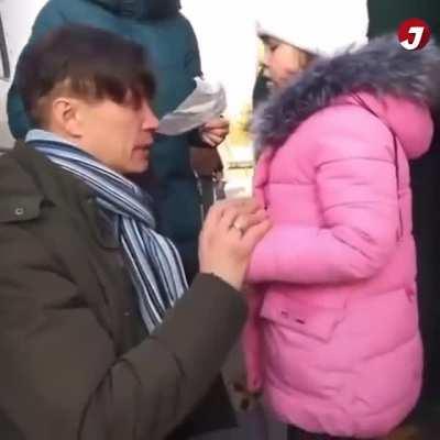 A Ukrainian father says goodbye to his family, while he stays behind to fight the Russians