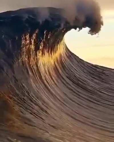 Wave touching the clouds