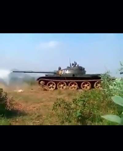Shell ejection out the back of a Vietnamese Army T62.