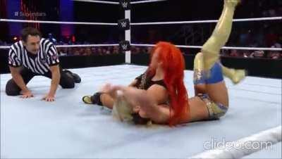 Becky Lynch gives Summer Rae a noogie