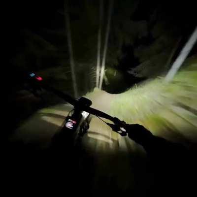 Downhill POV on a pitch-black mountain