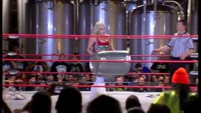 Taya kicks a chair into Jordynne's cooch