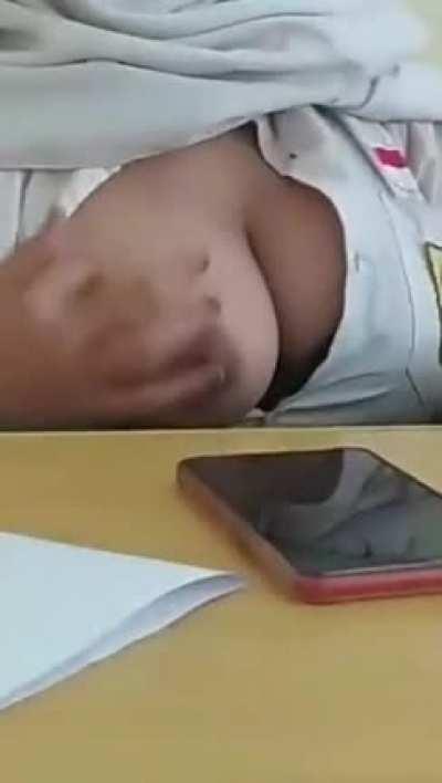 Asian nurse showing a boobie in public