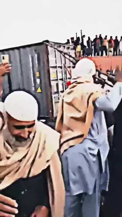 In order to demonstrate in the capital city supporters of political prisoner Imran Khan (former prime minister of Pakistan) are removing containers from their path while facing extreme tear gas shelling