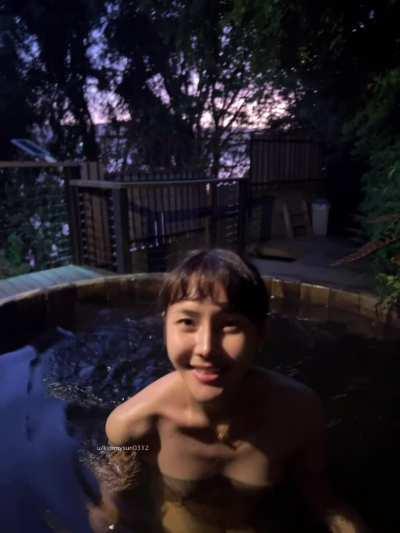 naked in outdoor hottub with a view