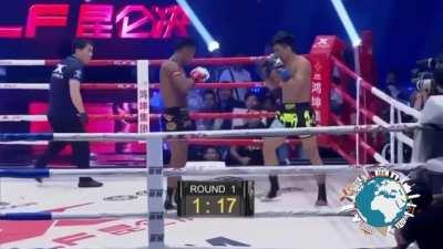 Buakaw lands a cool spinning back fist on his opponent