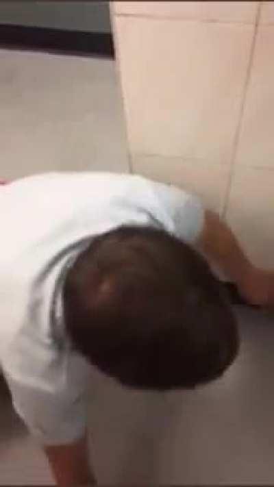 Two blokes take far too much in the pub toilet