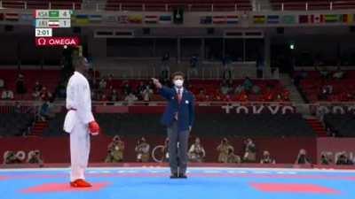 Athlete on the verge of country's first gold medal disqualified for a kick 