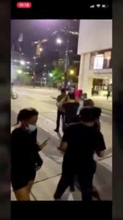 Police have Trapped Protesters in a Parking Garage and Begun hitting them with flashbangs