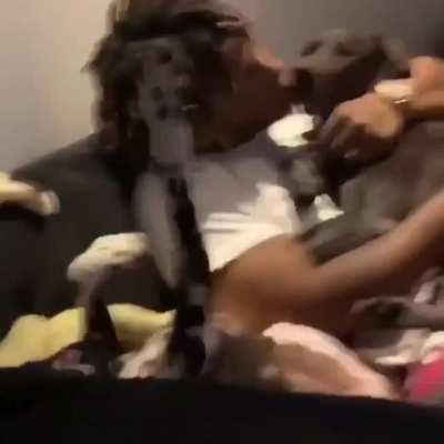 Juice hugging his dogs