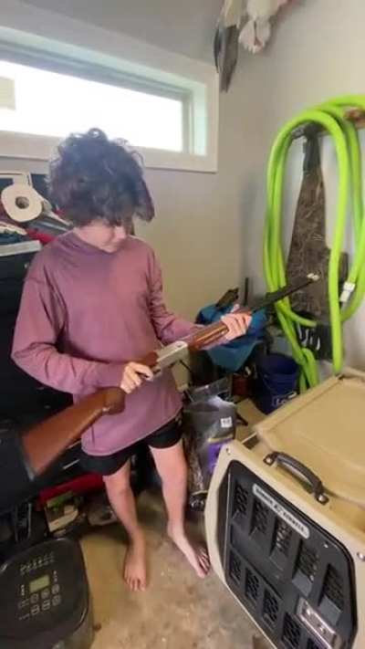 Australian kid first time with an unloaded weapon