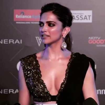 Who else can't control their left hand to slip inside right strap of her(Deepika Padukone) dress, feel her right boob bump on your palm; while her nipple bending to your palm as you gently grope her right tit ! Watch her left boob sudden tightness at 00:1