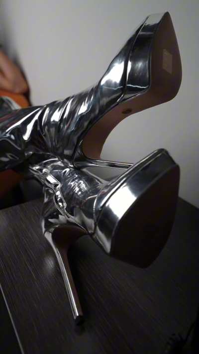 the less clothes you wear, the sexier the boots look