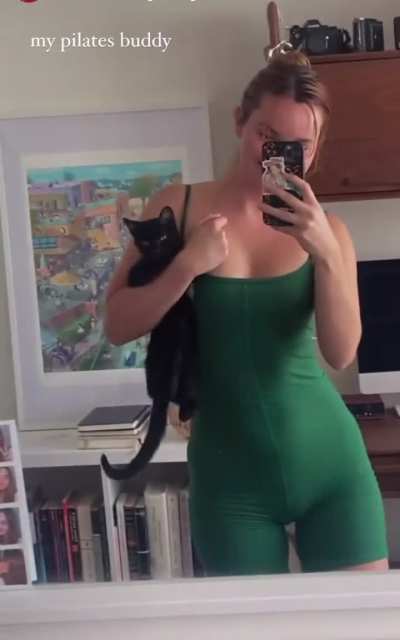 Liana in a nice onesie with her cat.. insta story 01.08.23