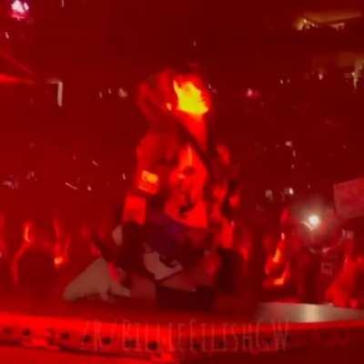 Billie Eilish on her knees