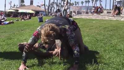 Woman purple belt challenges 3 men to tap her out for 1000$