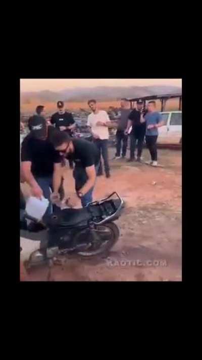 WCGW putting oil on bike