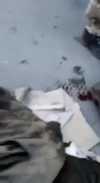 Ukrainian soldiers interrogate Russian Prisoners of War and then shoot them in the legs.