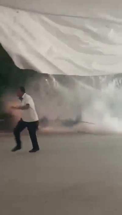 Guy at Brazilian bus terminal pops a giant water pimple 