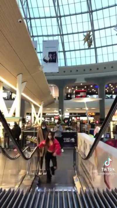 The guy just wanted to go up the escalator