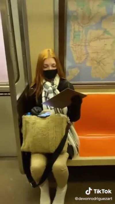 Painting a stranger on the subway results in surprise followed by tears of happiness