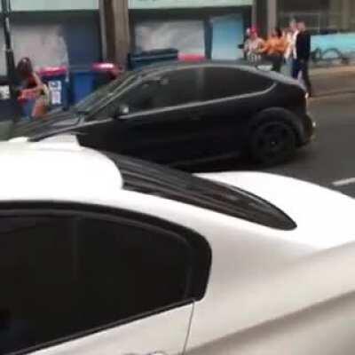 Freakout on streets, lesson is don't try to fight a car.