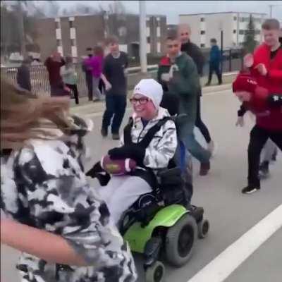 His classmates made sure to include him and to get him in on the game. All of the kids worked together to help him score a touchdown.