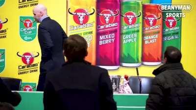 That moment when Erik Ten Hag forgets the Carabao Cup trophy as he leaves the post-match press conference