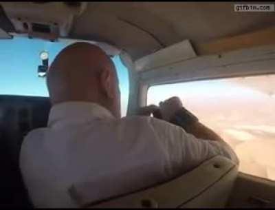 to take a photo in a plane