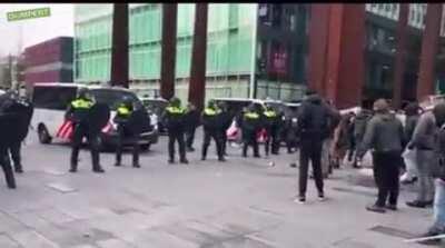 Rioter attacks police with sword